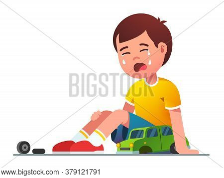 Sad Boy Kid Sitting Crying Over Broken Toy Car