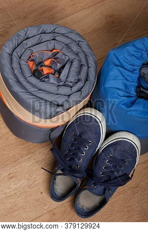 Tourist Equipment. Self-inflating Rugs And Sneakers. Lie On The Floor In The Room.
