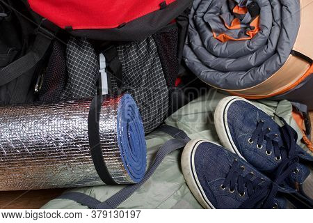 Tourist Equipment. Self-inflating Rugs And Sneakers. Lie On The Floor In The Room.