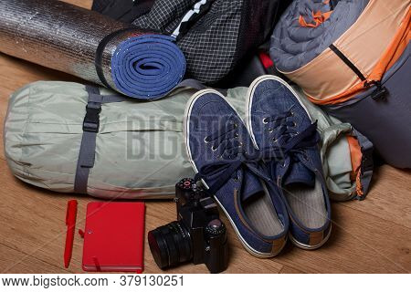 Tourist Equipment. Self-inflating Rugs And Sneakers. Lie On The Floor In The Room.