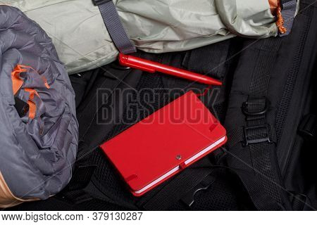 Tourist Equipment. Self-inflating Rugs And Sneakers. Close-up Shot.