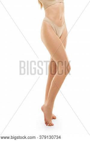Beauty. Beautiful Female Legs And Buttlocks Isolated On White Background. Beauty, Cosmetics, Spa, De
