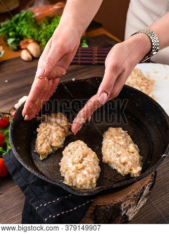 Womens Hands Sculpt Cutlets For Frying In A Pan, Closeup Opf Female Hand Cooking Cutlets On The Fryi