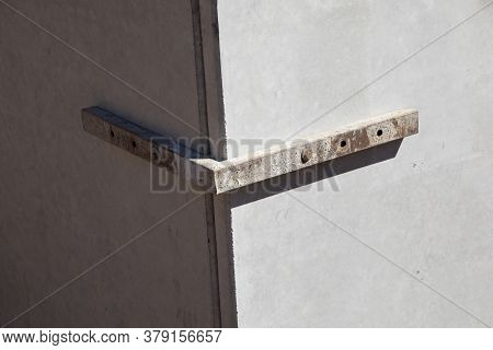 Detail Of Iron Angle To Keep Prefabricated Concrete Walls In Position Before Stabilized With Liquid 