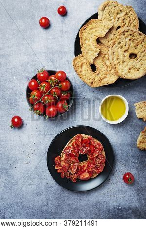 Concept Of Italian Food. Friselle With Tomato, Oil And Origano. Top Down View With Copy Space
