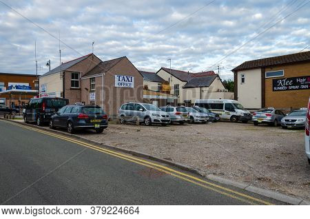 Prestatyn, Uk: Jun 6, 2020: A General Street Scene In The Town Centre With Taxi Cabs Parked Outside 