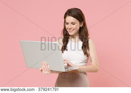 Smiling Young Brunette Woman Girl In Light Casual Clothes Posing Isolated On Pastel Pink Wall Backgr