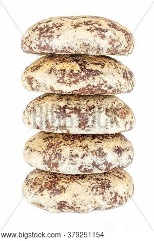 Five Whole Gingerbread Cookies In Stack Isolated On A White Background