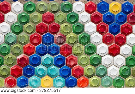 Mosaic Of The Soviet Period In The Form Of Honeycombs On A Concrete Wall.