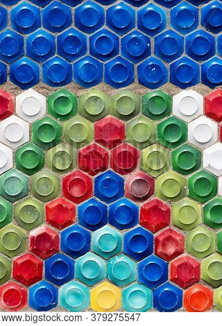 Mosaic Of The Soviet Period In The Form Of Honeycombs On A Concrete Wall.