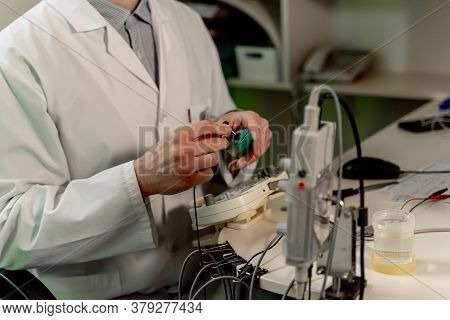 Electromyography Equipment. Medical Examination. Emg. Selective Focus On Doctor S Hands.
