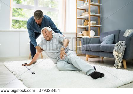 Helping Elder Senior Fallen Man After Fall Accident
