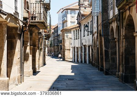Santiago De Compostela, Spain - July 18, 2020: Old Street With Arcades In Medieval Town
