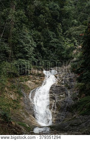 Mountain River Flowing Over The Stones. Wildlife Beauty In Malaysia