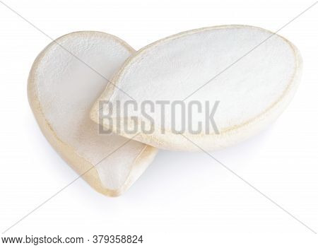 Pumpkin Seeds Isolated On White Background. Macro