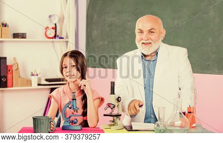 Experienced Pedagogue. Teacher Help Schoolgirl. Back To School. School Lesson. Excellent Pedagogue F