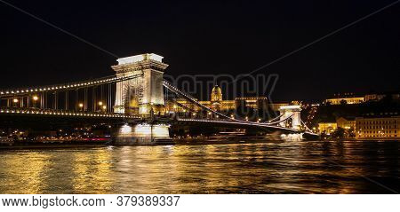 Long Exposure Of Széchenyi Chain Bridge, Buda Castle And The Danube River At Night In Summer, Budape