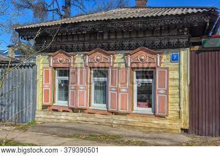 Russia, Irkutsk 06,05,2018 Wooden Architecture Of Siberia. Wooden Houses On Streets In The Center Of