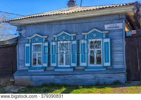 Wooden Architecture Of Siberia. Wooden Houses On Streets In The Center Of Irkutsk