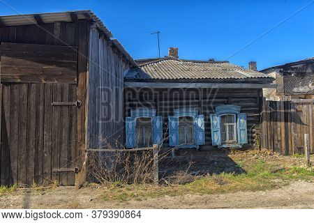 Wooden Architecture Of Siberia. Wooden Houses On Streets In The Center Of Irkutsk