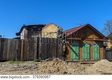 Wooden Architecture Of Siberia. Wooden Houses On Streets In The Center Of Irkutsk