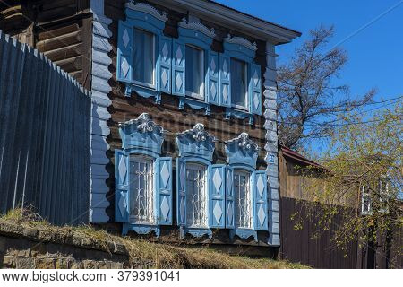 Wooden Architecture Of Siberia. Wooden Houses On Streets In The Center Of Irkutsk