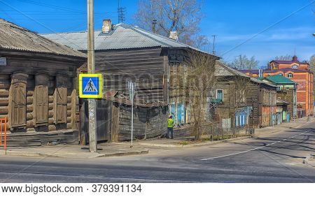 Russia, Irkutsk 06,05,2018 Wooden Architecture Of Siberia. Wooden Houses On Streets In The Center Of