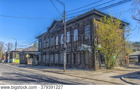 Russia, Irkutsk 06,05,2018 Wooden Architecture Of Siberia. Wooden Houses On Streets In The Center Of