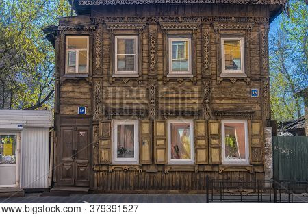 Russia, Irkutsk 06,05,2018 Wooden Architecture Of Siberia. Wooden Houses On Streets In The Center Of