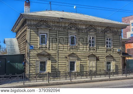 Russia, Irkutsk 06,05,2018 Wooden Architecture Of Siberia. Wooden Houses On Streets In The Center Of