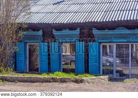 Russia, Irkutsk 06,05,2018 Wooden Architecture Of Siberia. Wooden Houses On Streets In The Center Of