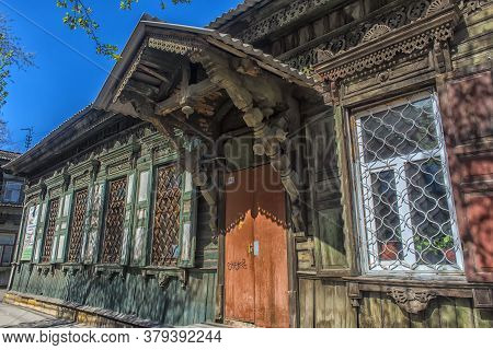 Russia, Irkutsk 06,05,2018 Wooden Architecture Of Siberia. Wooden Houses On Streets In The Center Of