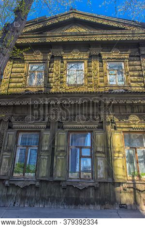 Russia, Irkutsk 06,05,2018 Wooden Architecture Of Siberia. Wooden Houses On Streets In The Center Of