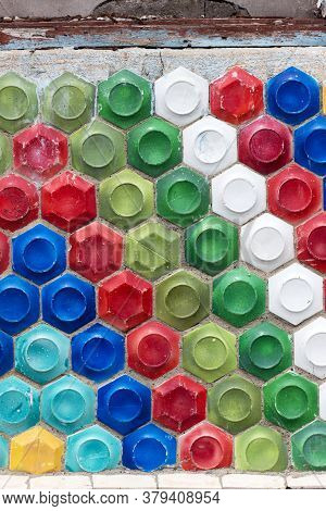 Mosaic Of The Soviet Period In The Form Of Honeycombs On A Concrete Wall.