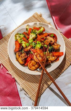 Chinese Shrimp With Mixed Sauteed Vegetables In A Brown Garlic Sauce