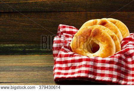 Hot Pandequesos On The Checkered Napkin - Traditional Colombian Food