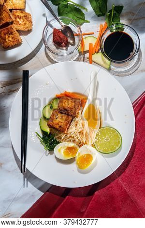 Thai Vegetarian Red Curry Rice Noodle Soup With Crispy Fried Tofu And Soft Boiled Egg