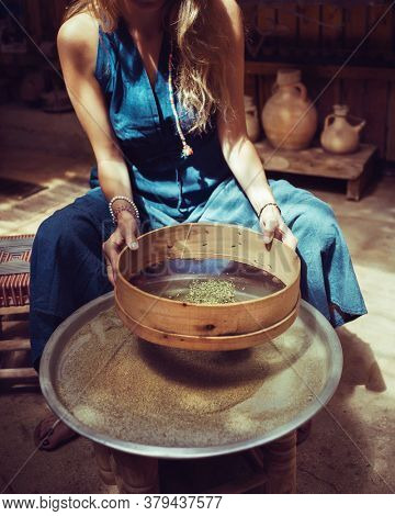 Woman Making Homemade Spices, Dry Zaatar. Traditional Lebanese Seasoning. Natural Antioxidant. 