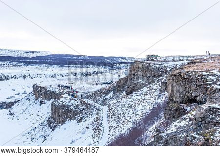 Gullfoss, Iceland - March 4, 2020: People At Viewpoint Over Gullfoss Waterfall, One Of The Most Popu
