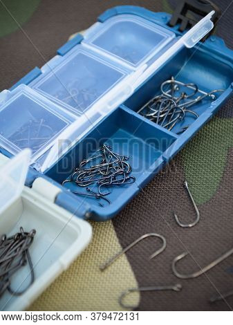 Fishing Rod Hooks In Blue Box Closeup Macro