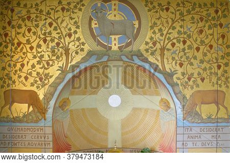 ZAGREB, CROATIA - NOVEMBER 26, 2014: Lamb of God, Agnus Dei with a cross, fresco in the church of Corpus Domini in Zagreb, Croatia