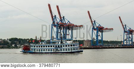 Hamburg, Germany - August 01, 2020: Louisiana Star Rear Wheel Steamer Drives In Front Of The Contain