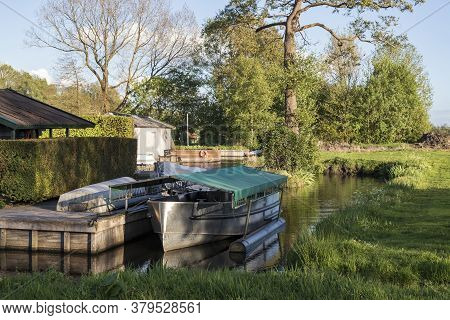 Anchored Bed On Canal At Glimmen, Holland.