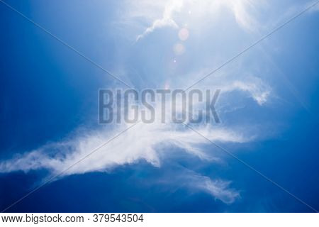 Scenic Landscape With Beautiful Cirrus Clouds In Clear Blue Sky. Colorful Cloudscape With Spindrift 