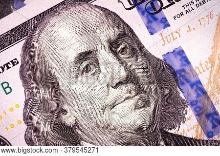 Fragment Of 100 Dollar Bill. Close Up Of American Currency. Us Dollar Background.. Macro Shot.