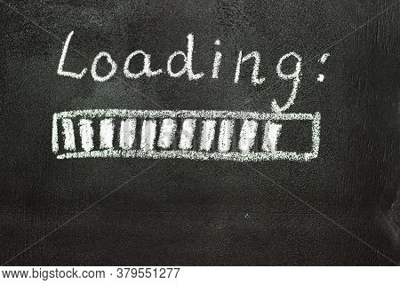The Loading Process Is Shown In White On A Chalkboard. Stop Motion Animation.