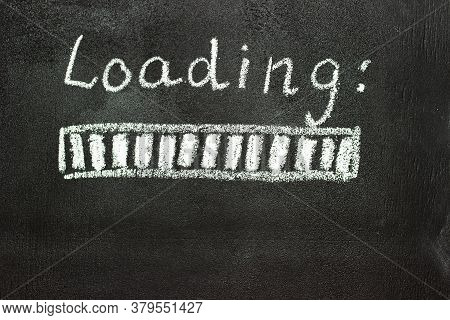 The Loading Process Is Shown In White On A Chalkboard. Stop Motion Animation.