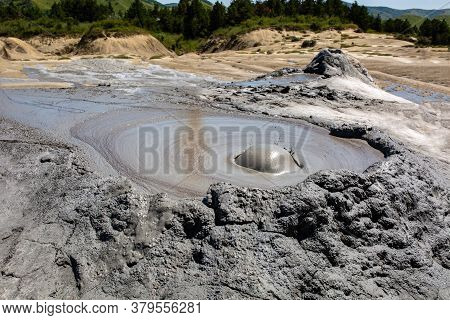 Mud Geyser Or Mud Volcano. Geological Formation. Particular Hydrogeological Conditions Generally All