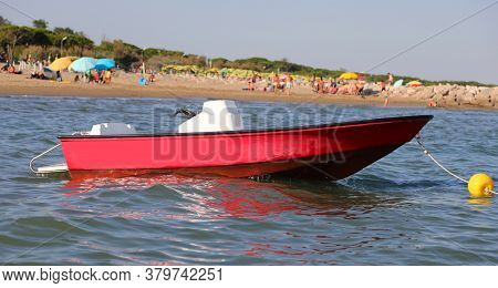 Red Motorboat To The Rescue Of Bathers In The Sea