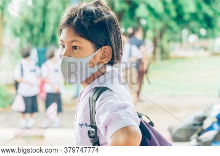 Kanchanaburi,thailand-july 2,2020:unidentified Elementary School Students Wear Face Mask To Prevent 